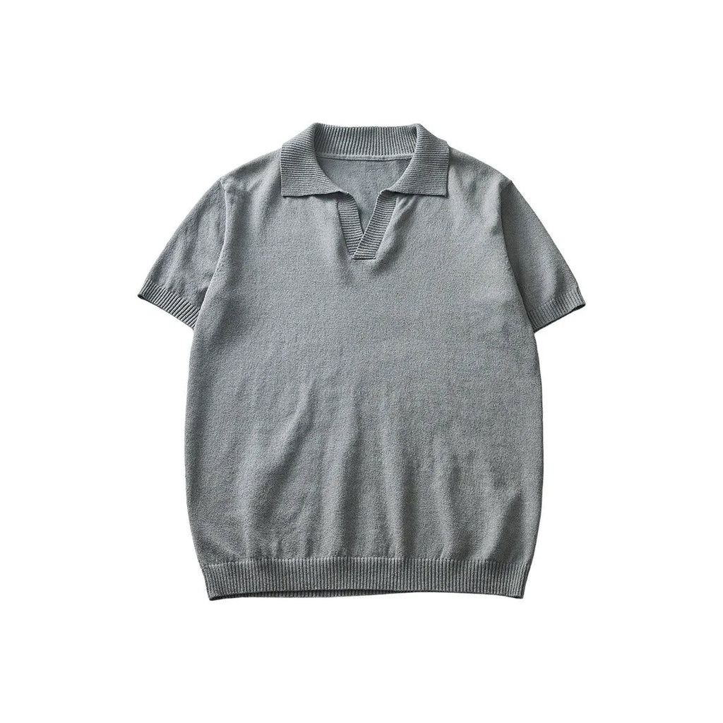 Men's solid colour knitted polo T-shirt in acrylic fabric for summer, shown on a hanger.