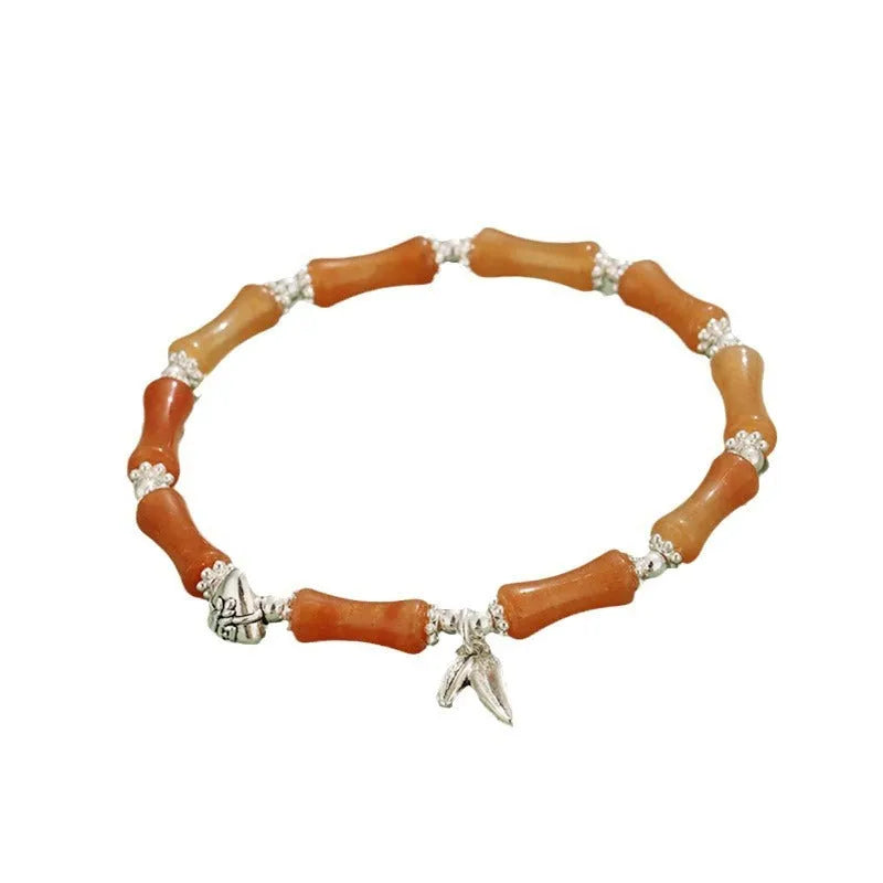 Green Aventurine bamboo crystal bracelet with multiple gemstones including strawberry quartz and olive jade