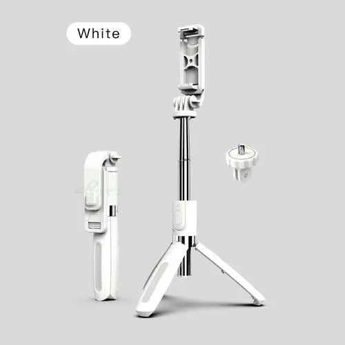 Black Bluetooth selfie stick extended to full length with phone attached, next to its wireless remote and tripod base.