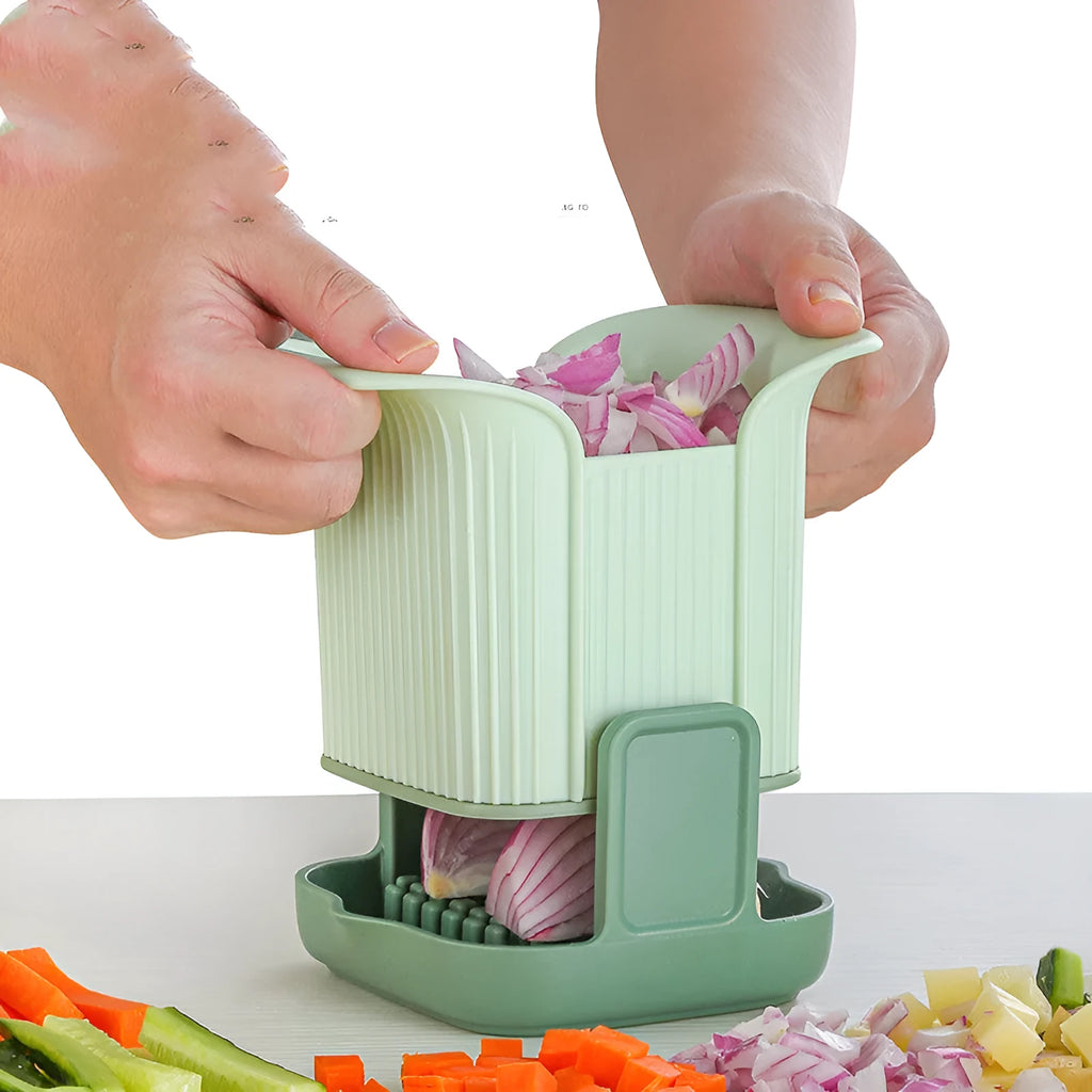 Green manual vegetable chopper with stainless steel blades for slicing onions, potatoes and cucumbers