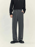 Black draping straight-leg business casual trousers on hanger
