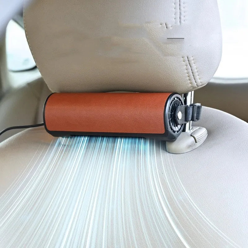Black bladeless car fan mounted in vehicle with USB power connection and control buttons visible