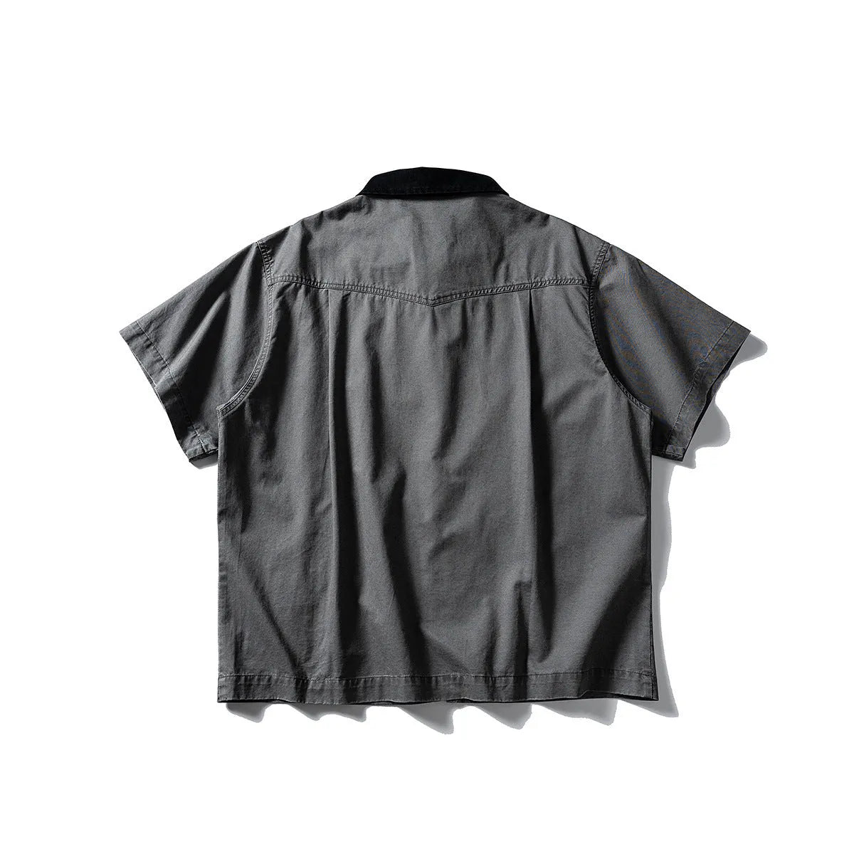 Washed overalls shirt in khaki colour with short sleeves and loose-fit cardigan style for teenagers