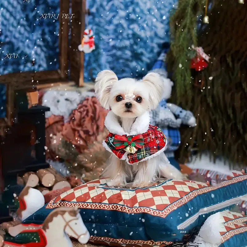 Polyester pet scarf with festive snowflake and bell designs in multiple sizes for winter and holiday use.