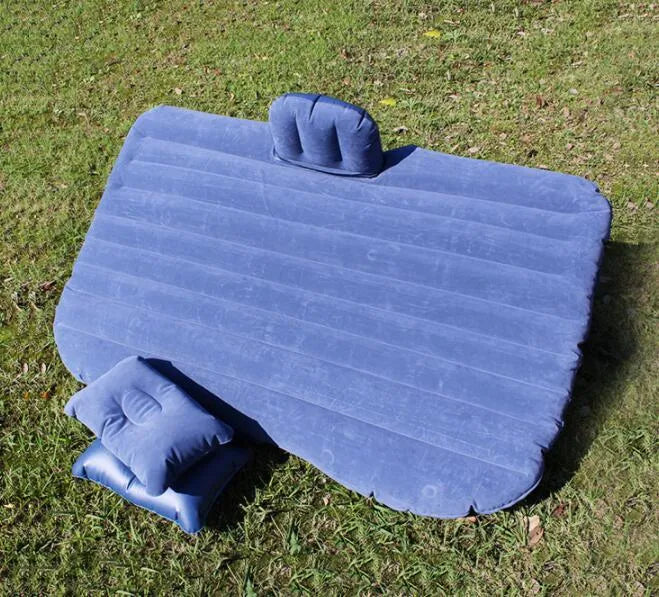 Black wave colour inflatable car bed with two pillows on a car seat