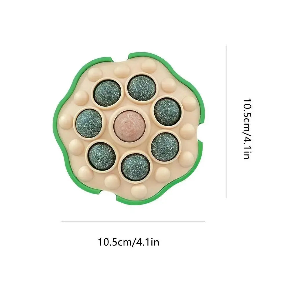 Green lotus-shaped catnip ball with adhesive backing for wall mounting