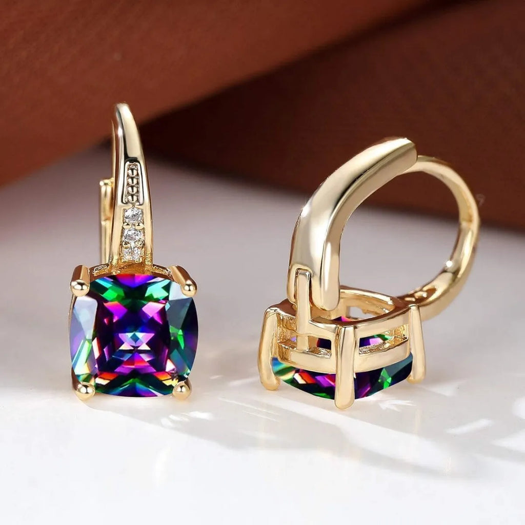 Geometric quadrilateral ear clips with moissanite inlays and electroplated copper construction in gold finish