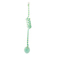 Kitten spring toy with blue inflatable ball hanging from suction cup on glass door
