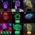 Black and colourful 3D remote control LED desk lamp on a desk