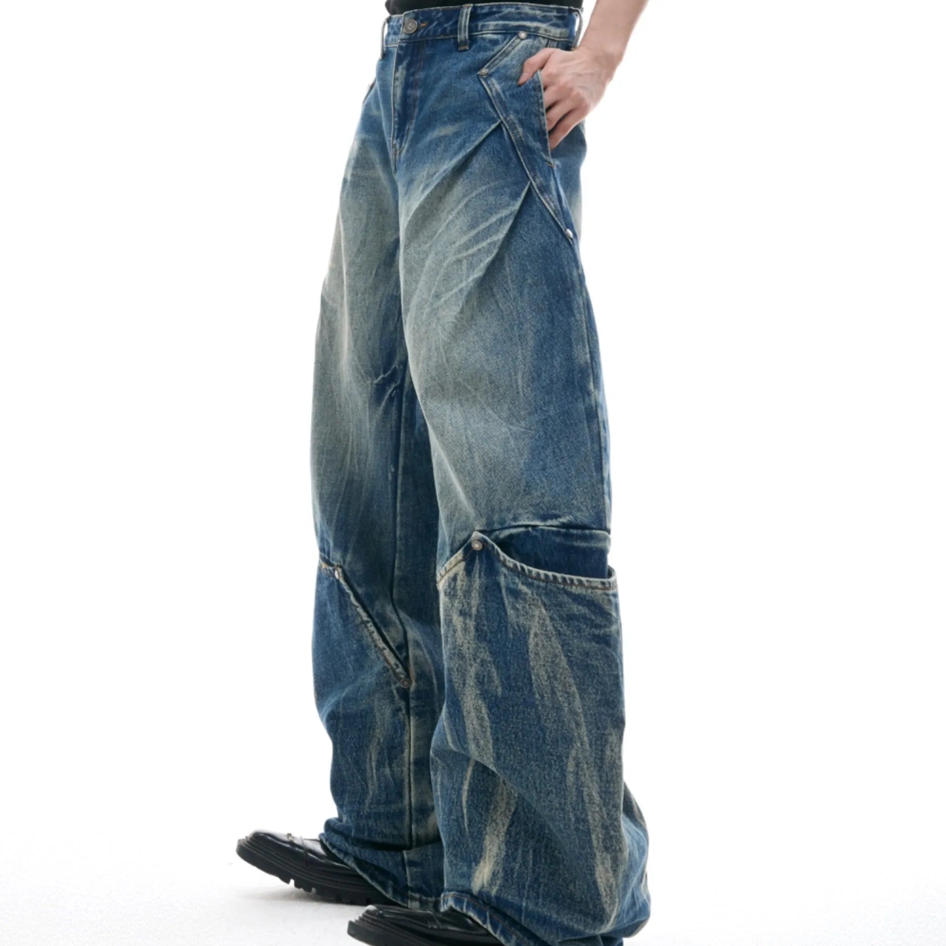 Men's verdant blue jeans with washed burst pattern and curved knife detailing, loose fit design