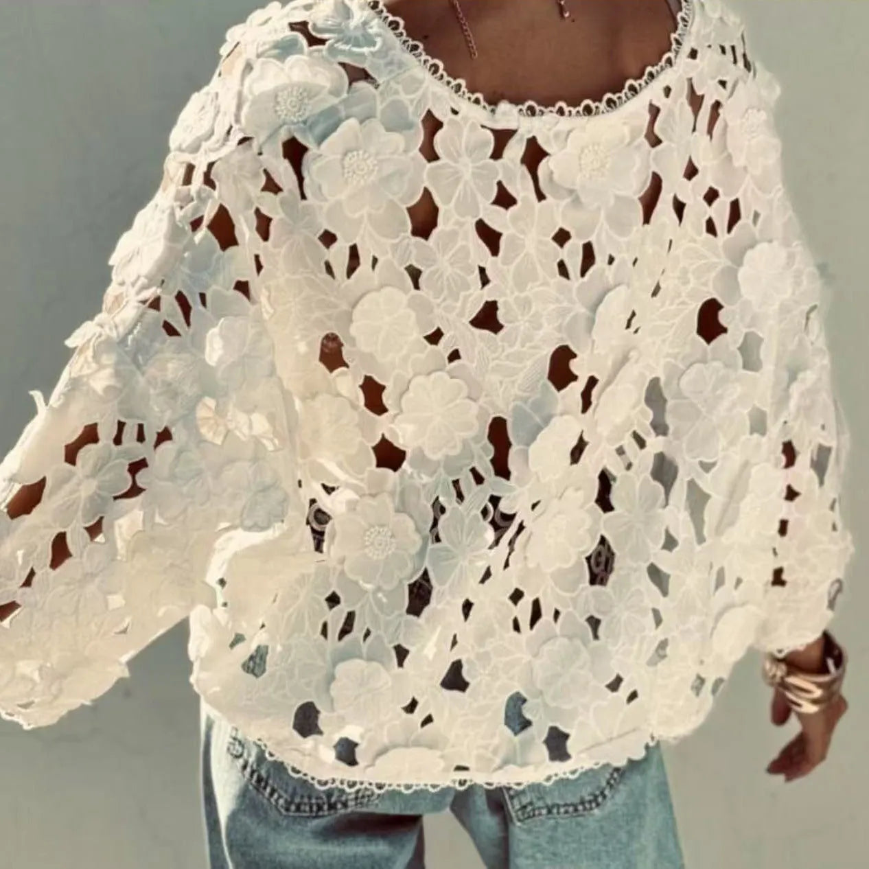 Black polyester lace cardigan with three-dimensional floral decoration and V-neck design on hanger