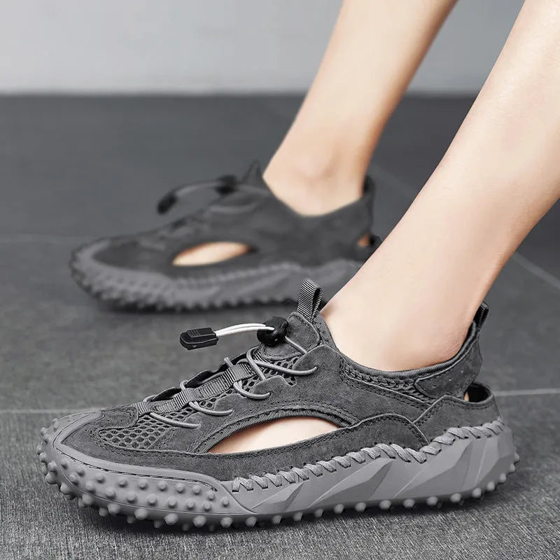 Men's waterproof sports sandals with leather mesh upper and rubber sole in toe-cap design