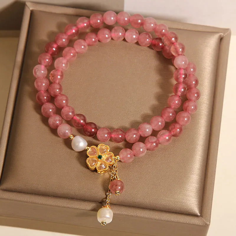 Women's double ring bracelet with strawberry quartz and four-leaf clover charm in Japanese-Korean style