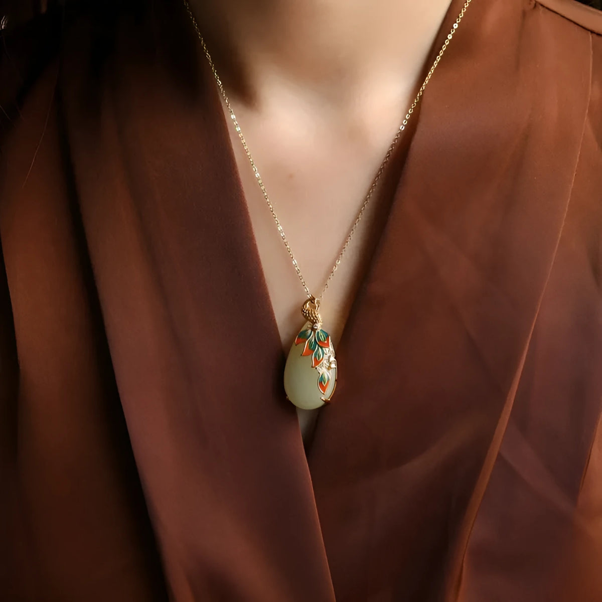 Phoenix pendant necklace with white jade effect and electroplated copper, shown with optional 40cm gold necklace