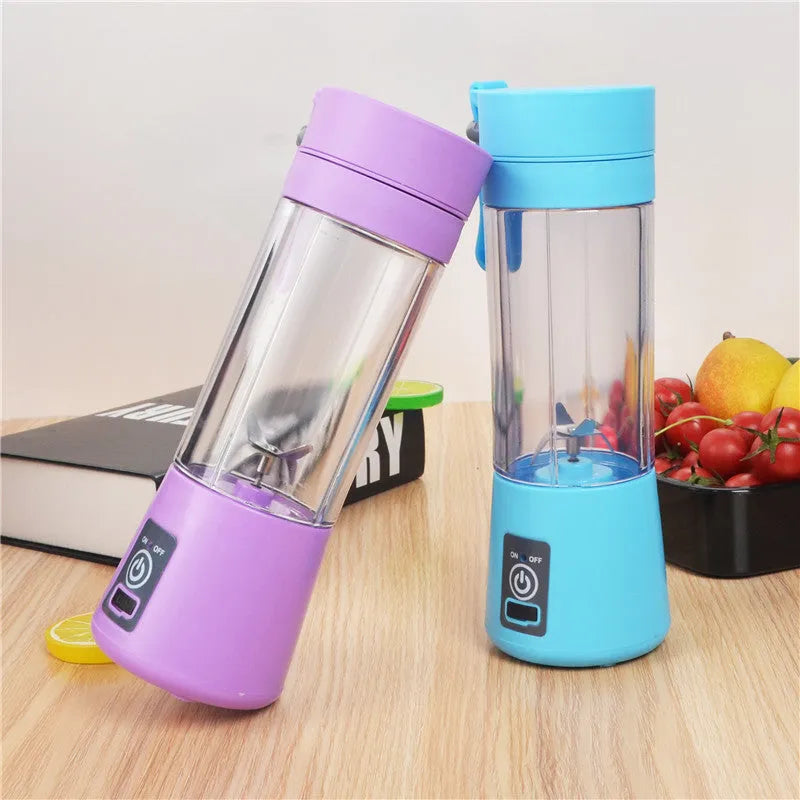 Mini USB electric fruit juicer in pink with stainless steel blade and carry rope