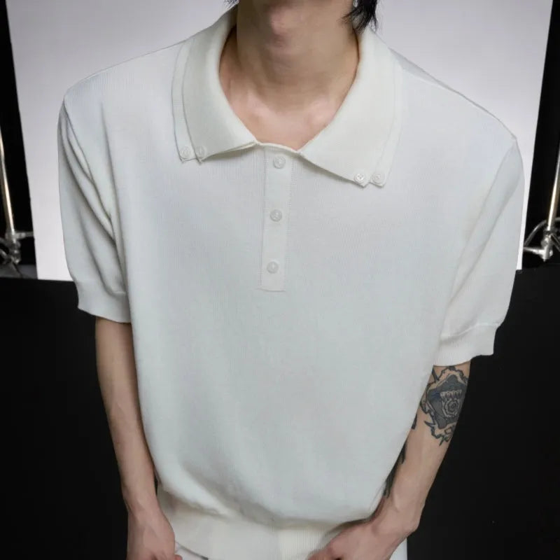 Men's black short-sleeved shirt with double collar design and slim knit fabric, laid flat.