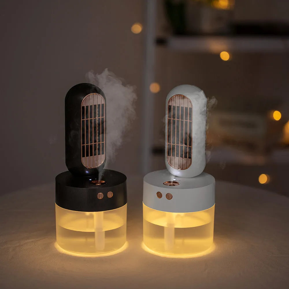 Small black and white desktop humidifier fan with shaking head oscillation and USB charging port