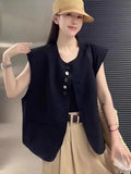 Women's loose-fit polyester vest in milky white with two front pockets, 40cm length