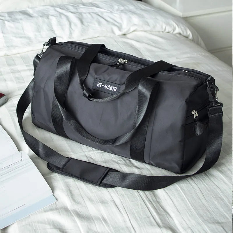Beige nylon sports rucksack with contrast colour design and letter pattern showing interior