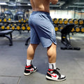 Men's quick-dry sports running shorts in black with contrast colour detailing
