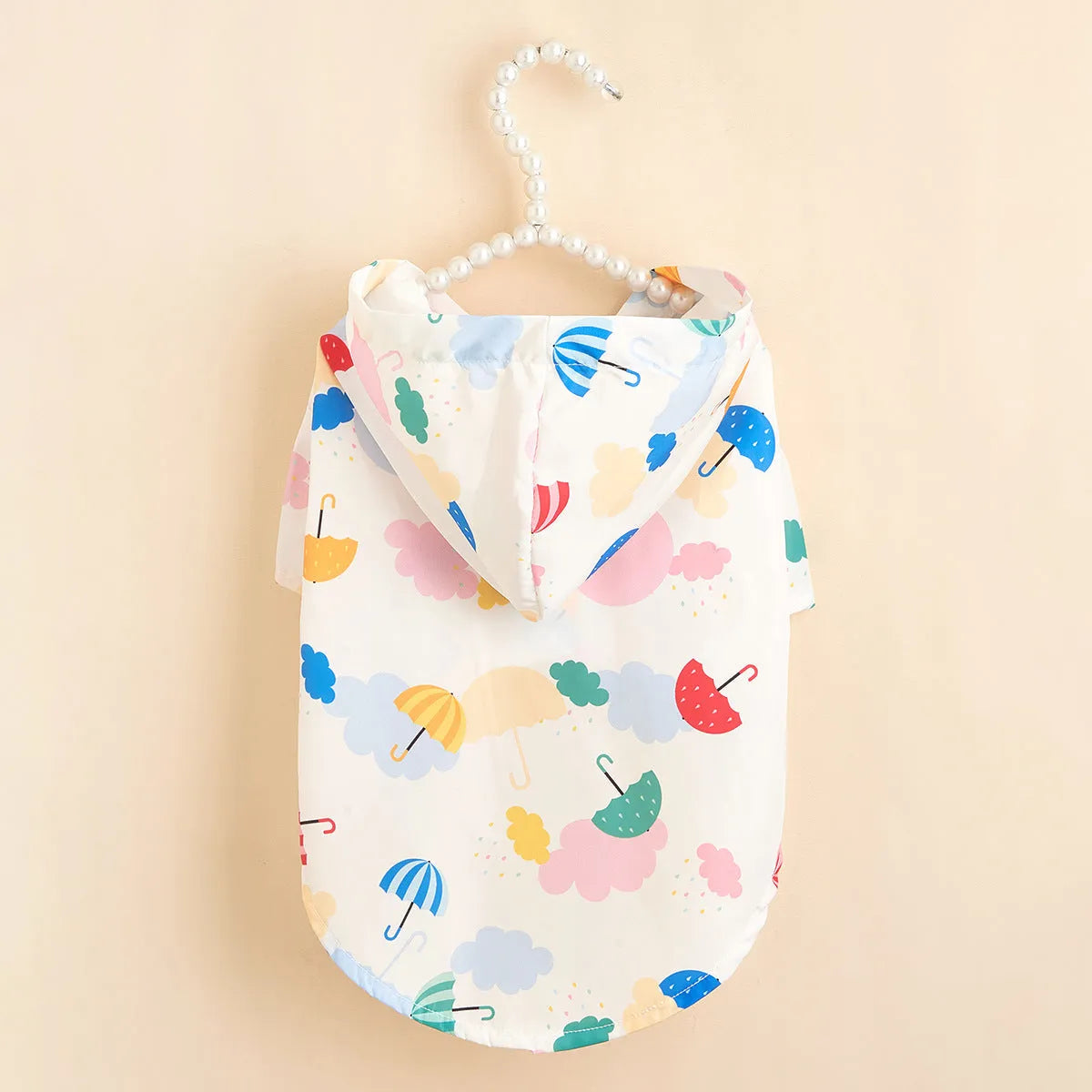 Cartoon umbrella pattern pet raincoat in polyester for dogs and cats, waterproof protection in sizes XS to XL