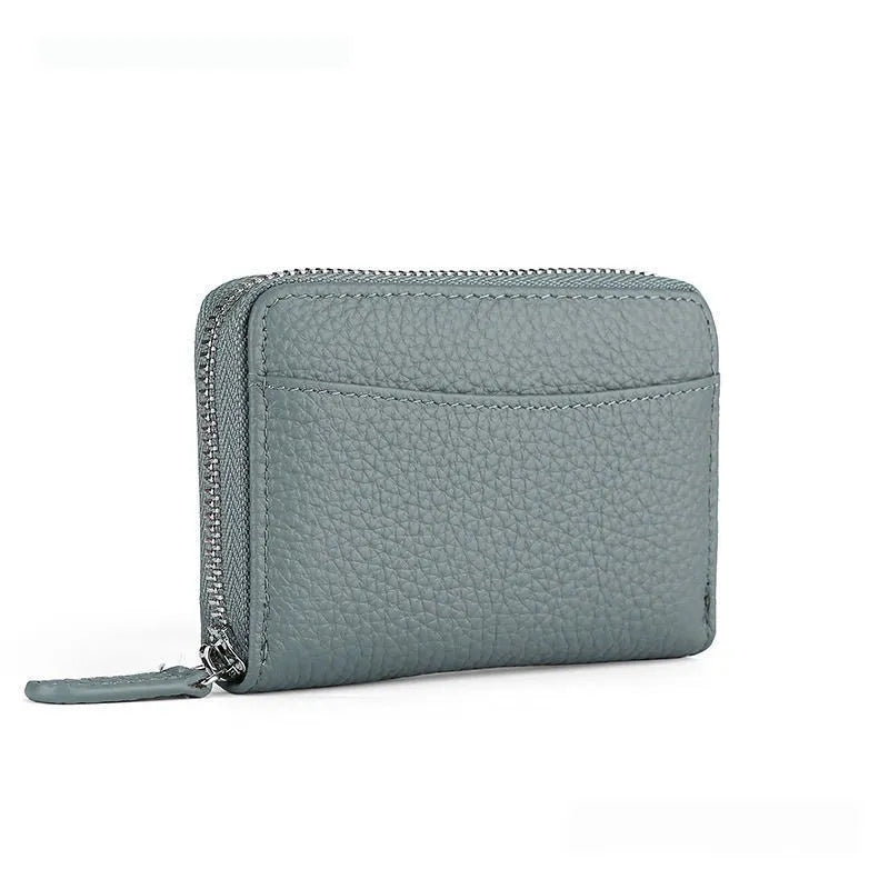 Genuine leather zipper coin storage bag with anti-theft swiping function in solid colour design