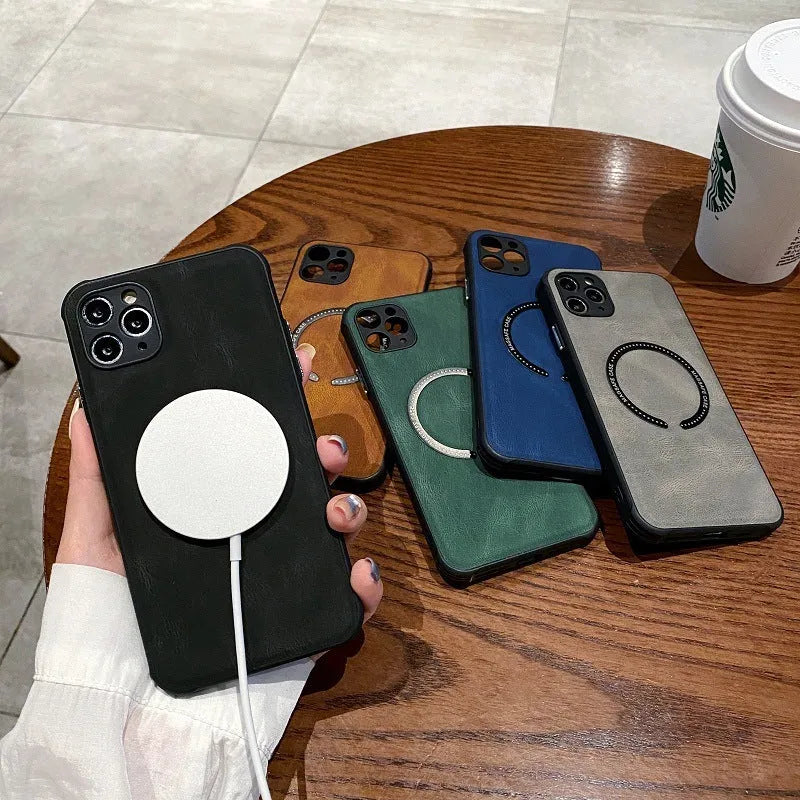 Black imitation leather magnetic charging case for iPhone on a magnetic charging puck