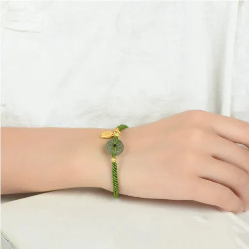 Hand-woven corn knot bracelet with Hetian jade safety buckle on green flexible wire