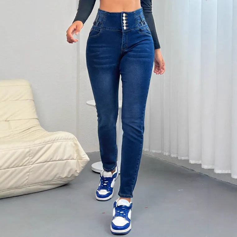 Women's dark blue denim trousers with breasted front buttons and straight-leg cut on hanger