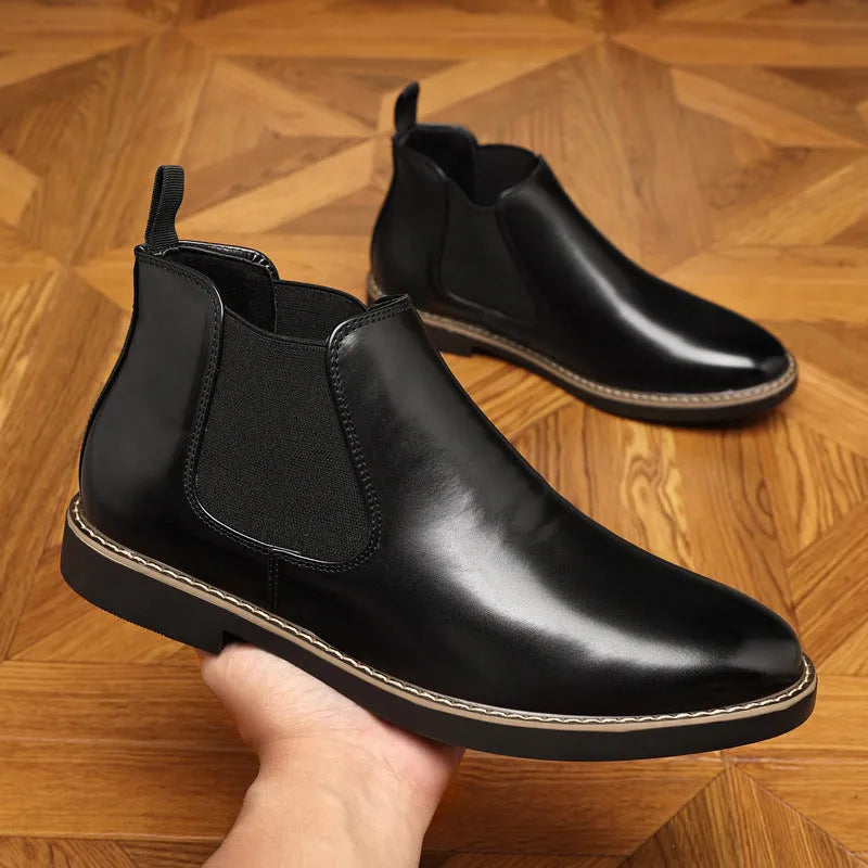 Men's black formal pointed-toe leather boots with a square rubber heel.