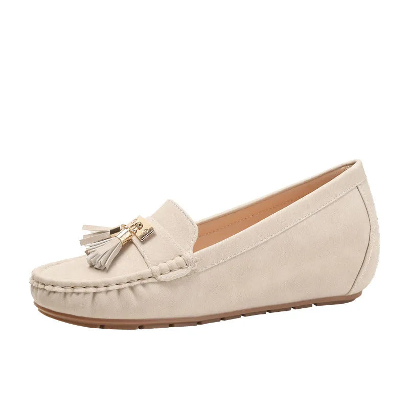 Beige women's oversleeve casual shoes with a round toe and mid heel for height increase.
