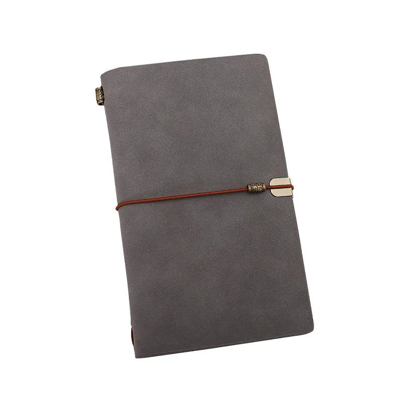 A6 notebook with imitation leather cover in choice of grey, pink, or red, showing cowhide rope style binding.