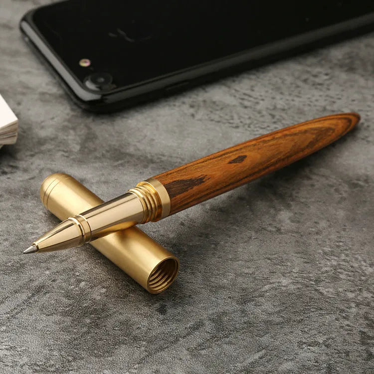 Brass and solid wood signature pen in choice of five wood finishes including ebony and rosewood.