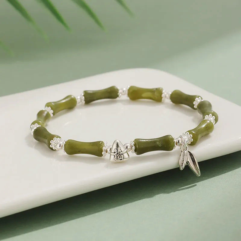 Green Aventurine bamboo crystal bracelet with multiple gemstones including strawberry quartz and olive jade
