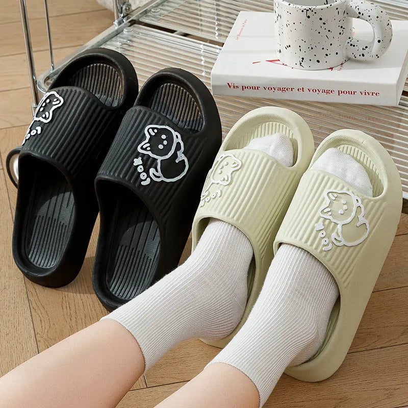 Green cat-themed thick platform sliders with a non-slip EVA sole on a white background.