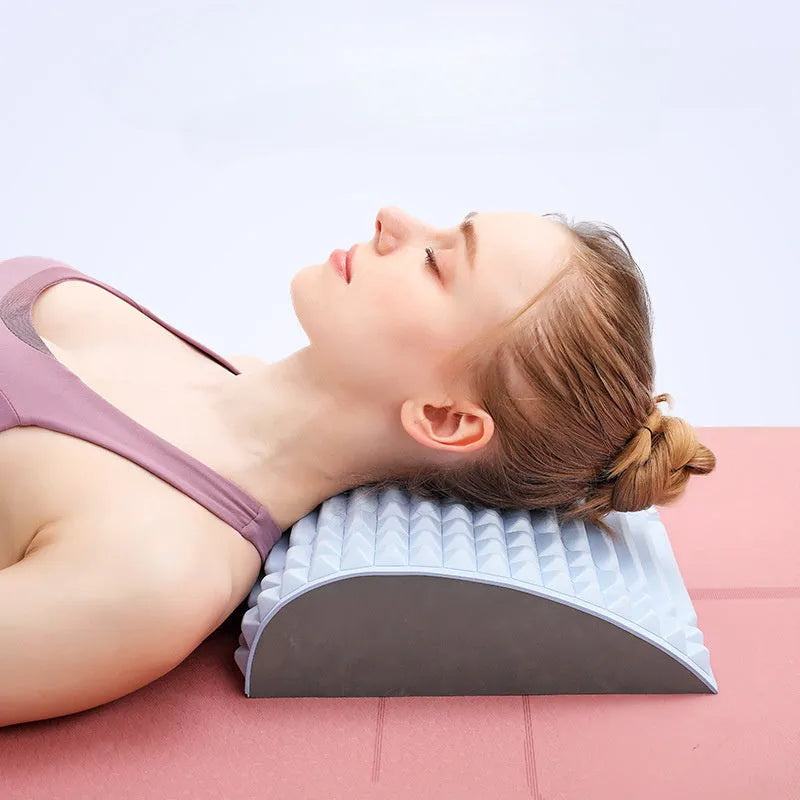 Blue EVA foam back stretcher pillow for lumbar and neck support on a plain background.
