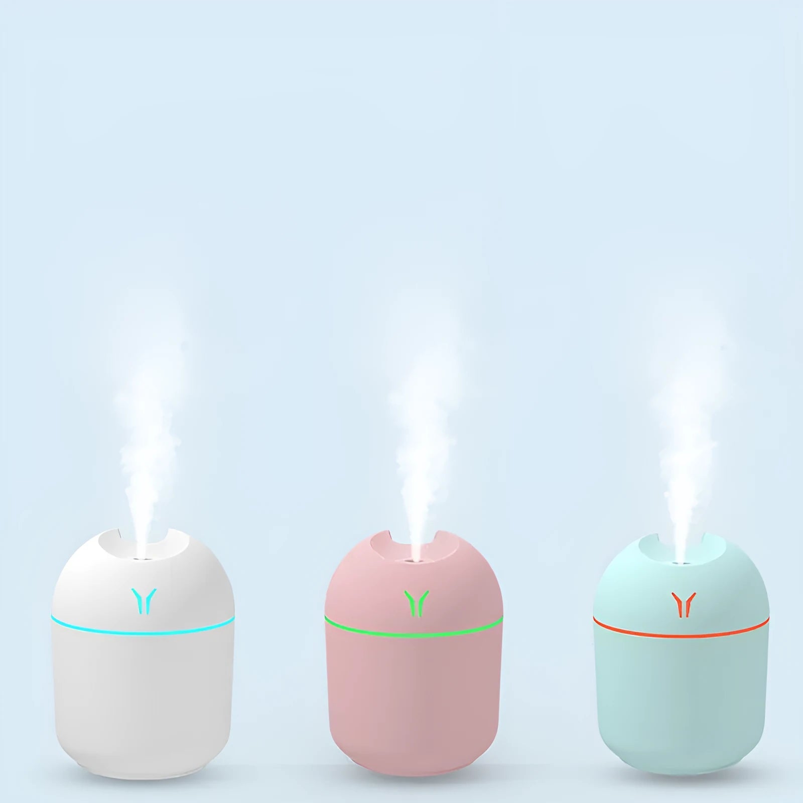 Round desktop USB humidifier in ivory white, sky blue, or girlish pink with 250ml water tank.