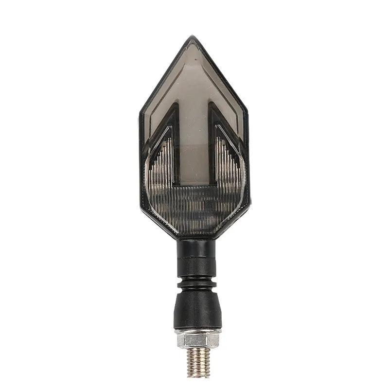 Arrow-shaped LED motorcycle turn signal lamp for 12V systems, made from black ABS plastic.