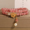 Women's double ring bracelet with strawberry quartz and four-leaf clover charm in Japanese-Korean style