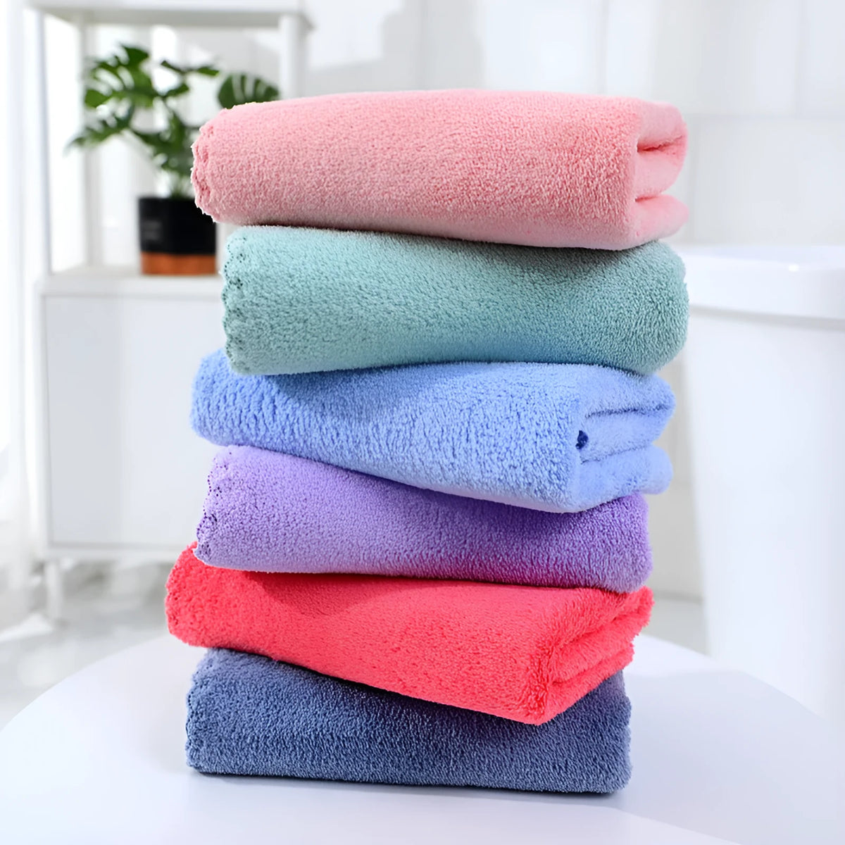 Coral fleece towel in 30x60cm and 35x75cm sizes, available in twelve colours for household use.