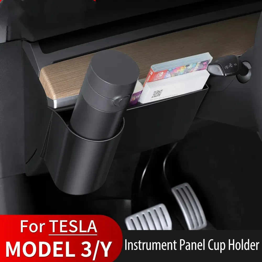 A plastic water cup holder designed for the dashboard of a left-hand drive Tesla Model 3 or Model Y.
