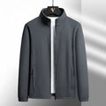 Men's grey Berber fleece cardigan with a stand-up collar and front zip, showing zippered hand pockets.