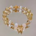 Moonstone white crystal bracelet with diamond-shaped beads and citrine butterfly charm in Chinese style design