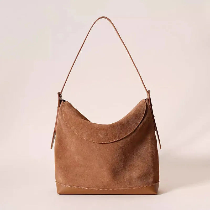 Genuine leather women's shoulder bag in retro style with clamshell design and internal organisers