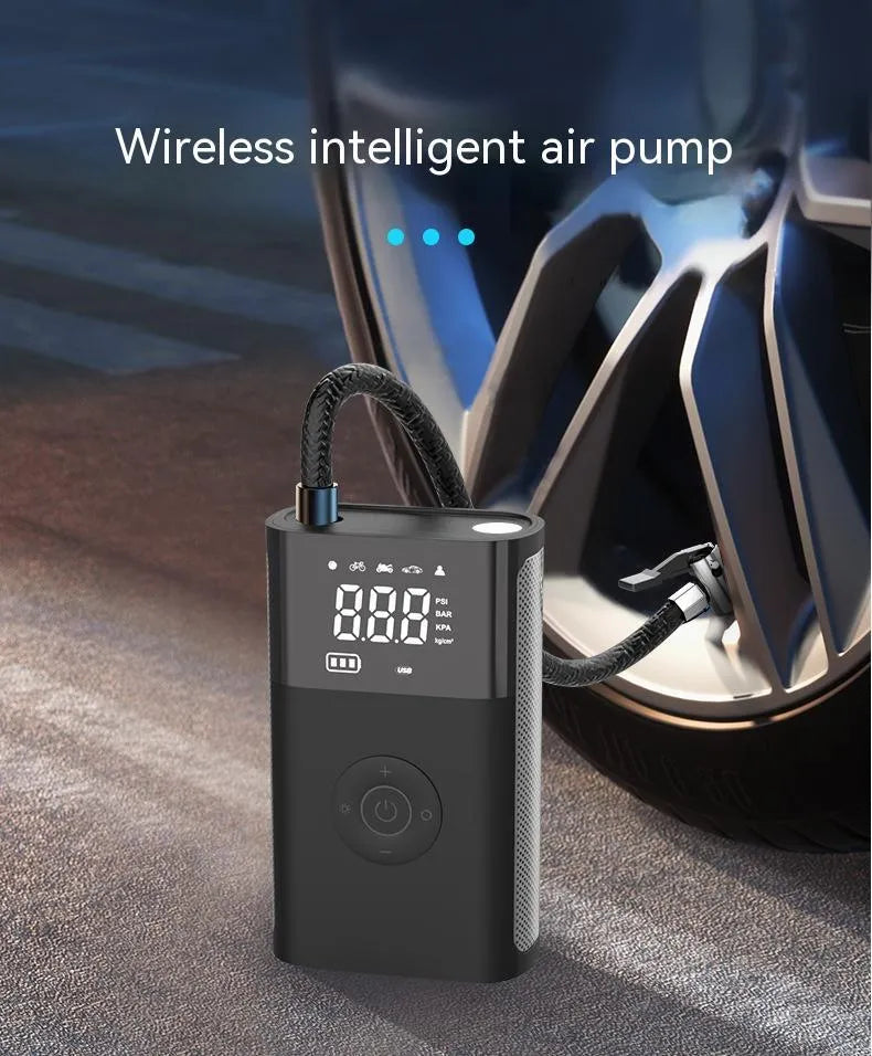 Wireless handheld digital display air pump with LCD screen showing tyre pressure, three nozzles, and charging cable
