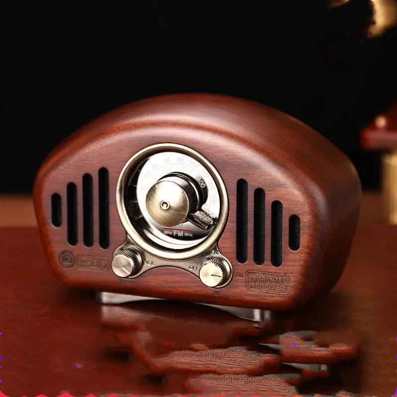 FMAM portable Bluetooth speaker with FM radio in Cherry or Walnut, 3600 mAh battery, USB interface.