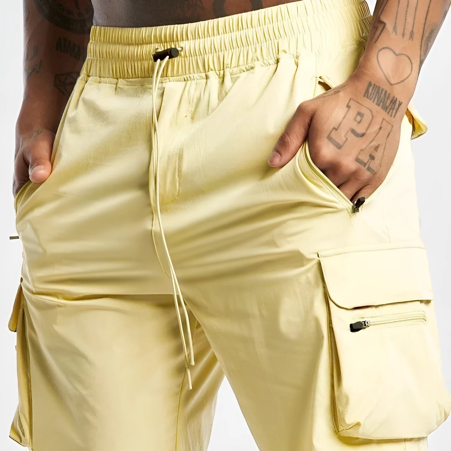 Men's black quick-dry sports shorts with four-sided stretch, shown on a model for running and fitness.