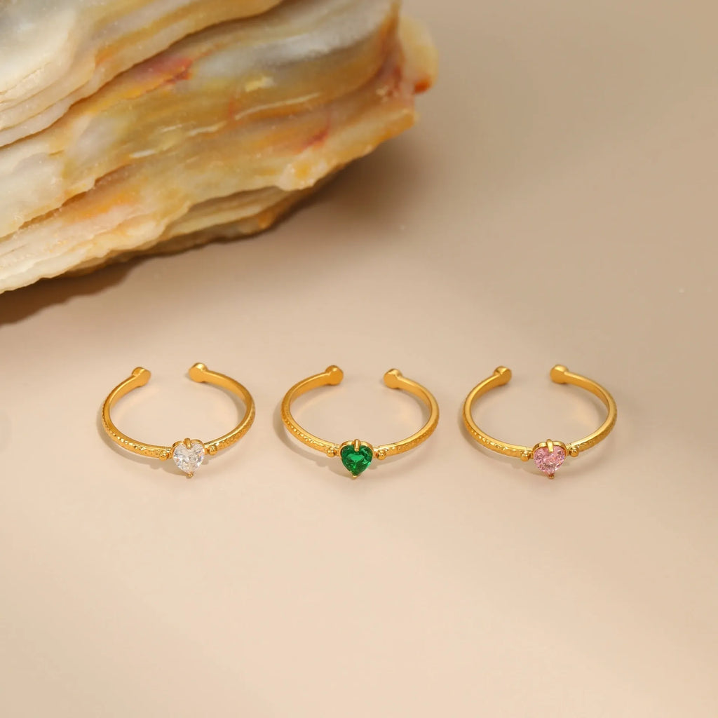 Open ended heart ring with zircon stones in stainless steel, showing adjustable free size design