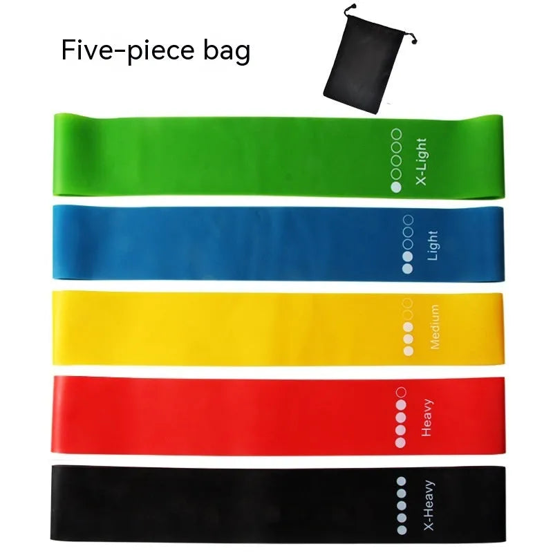 Five colour-coded TPE yoga tension straps with force marks arranged by thickness from 0.5mm to 1.1mm
