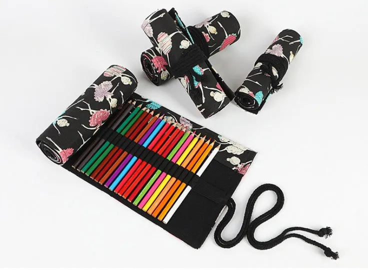 Canvas rolling pencil case with ballet girl print, shown open to reveal multiple pencil slots.